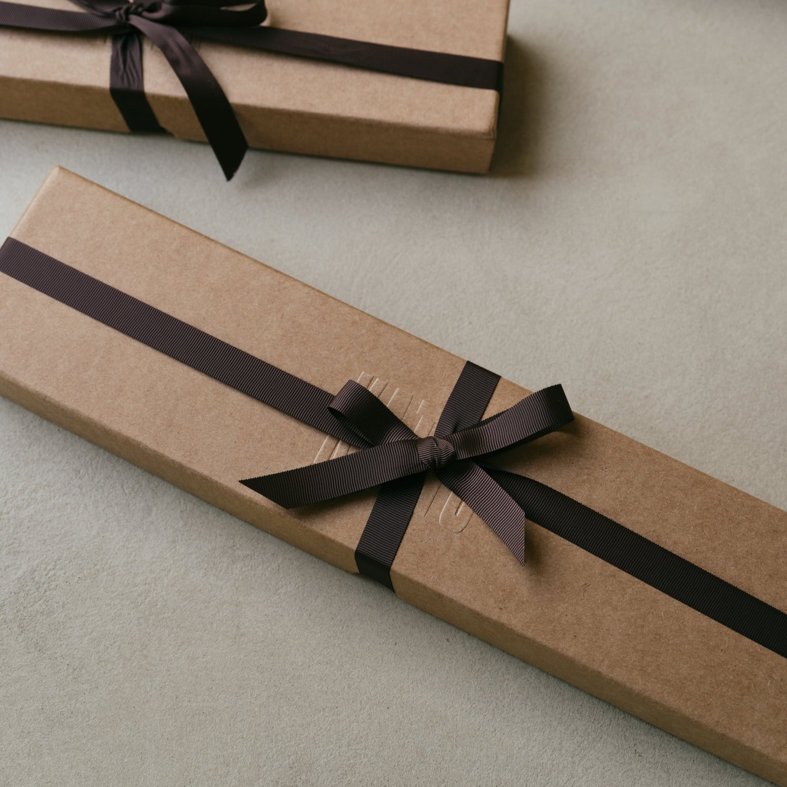 Katto gift boxes tied with ribbon